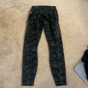 Green camo Fabletics leggings with pockets